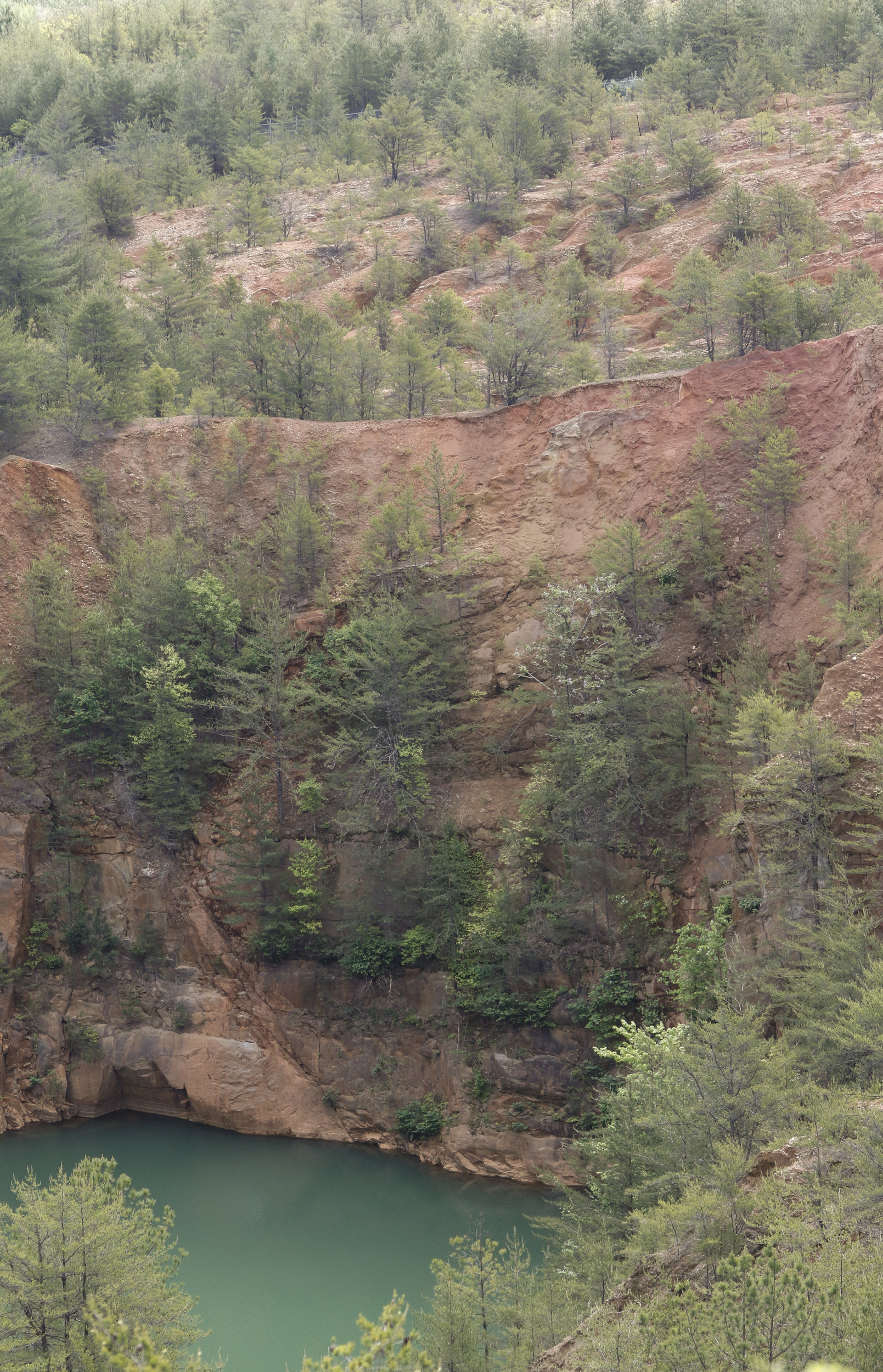 A collapsed mine is visible from an overlook at the Ducktown Basin Museum.
