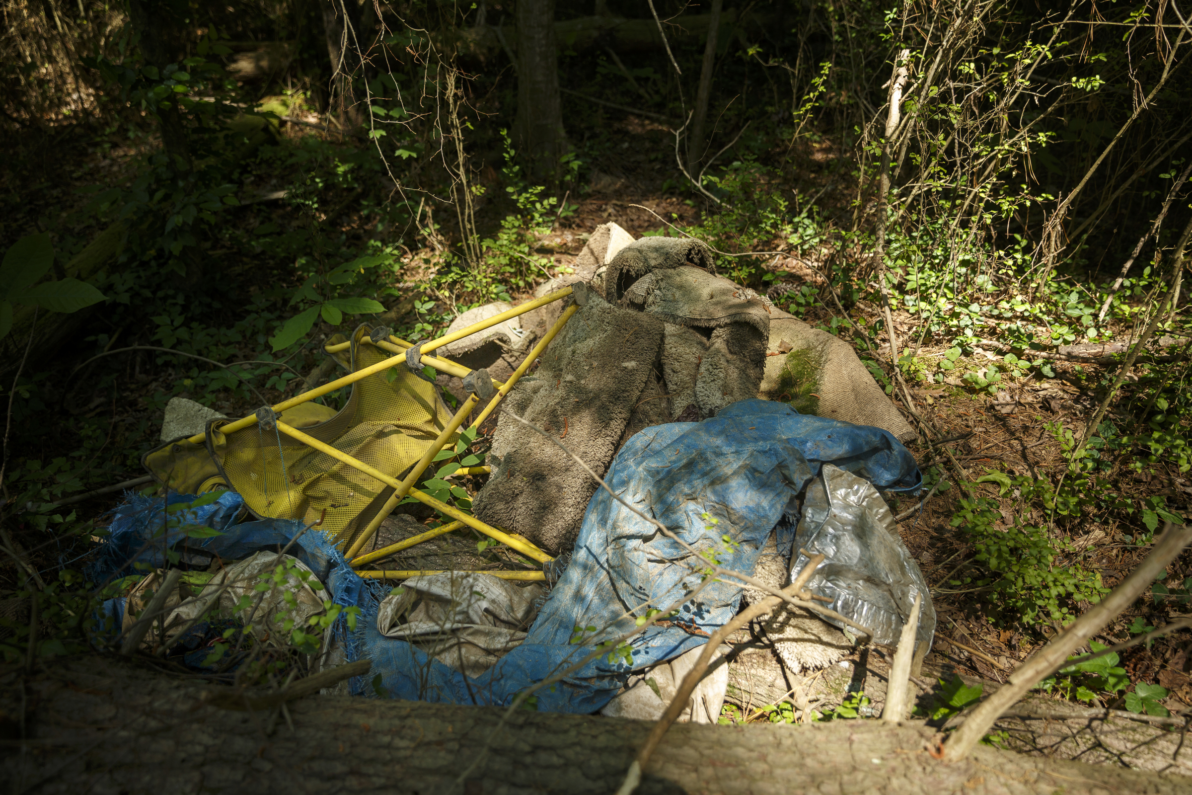 Evidence of a former homeless camp still remains near the site of a new canoe put-in on Longview Drive for North Chickamauga Creek on Wednesday, May 11, 2016, in Hixson, Tenn.