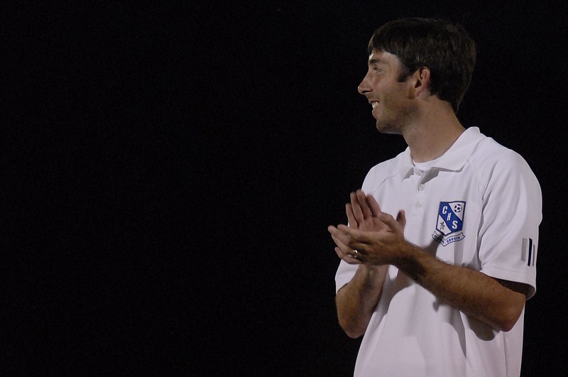 Cleveland High School boys' soccer coach John Brose and his Blue Raiders earned the District 5-AAA title with Wednesday's 3-2 overtime win against McMinn County. Graham Hammond scored twice to lead Cleveland.