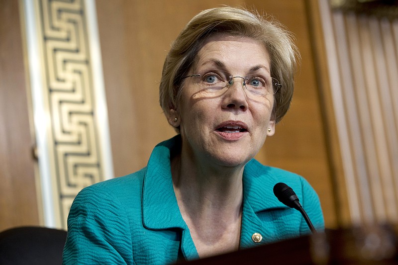 
              In this photo taken Oct. 6, 2015, Sen. Elizabeth Warren, D-Mass. speaks on Capitol Hill in Washington. Warren has taken to Twitter again to bash Donald Trump, the latest in a series of Internet "tweetstorms" calling Trump on the carpet for his treatment of women and his insults toward her. (AP Photo/Jacquelyn Martin)
            