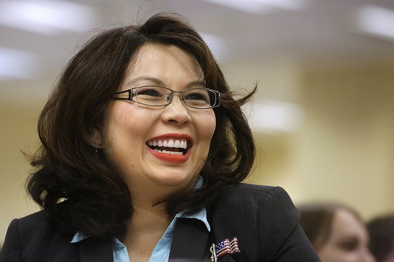 
              FILE - In this Aug. 13, 2014, file photo, U.S. Rep. Tammy Duckworth, D-Ill., appears at a brunch in Springfield, Ill. Duckworth, a Democratic candidate for U.S. Senate, is trying to unseat U.S. Sen. Mark Kirk, in the November 2016 general election. (AP Photo/Seth Perlman, File)
            