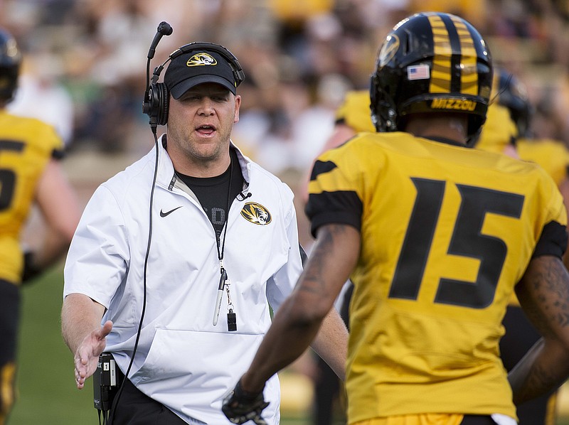 Missouri football coach Barry Odom, who's preparing for his first season leading the program, wants to win over former fans of the St. Louis Rams after the NFL franchise moved out of the city earlier this year.