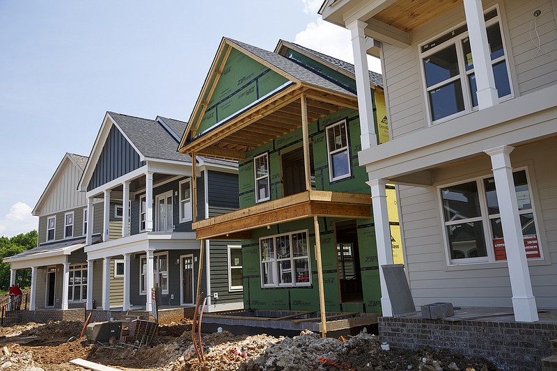 Homes are seen under construction along Park Avenue off of Main Street on Thursday, May 12, 2016, in Chattanooga, Tenn.