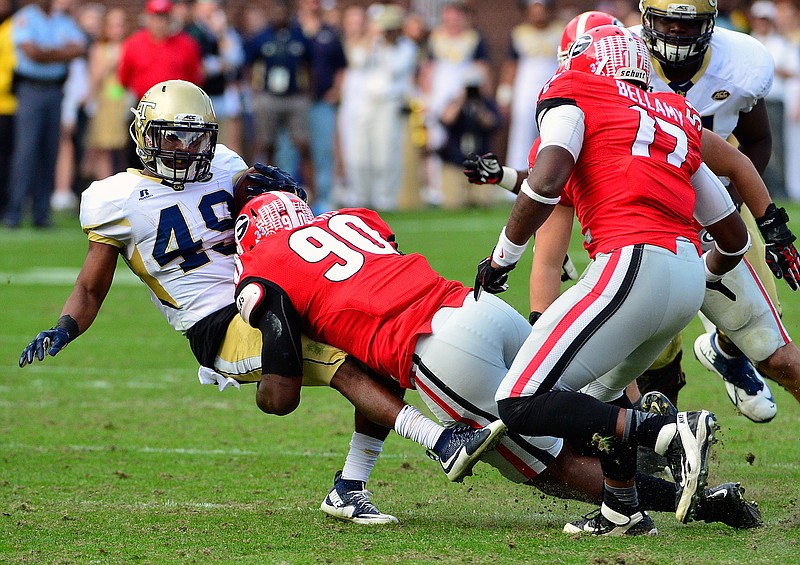 Georgia defensive end Chauncey Rivers, shown here stopping Georgia Tech running back Clinton Lynch last November in Atlanta, was dismissed from the team Friday.