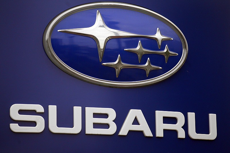 A Subaru logo is displayed on a sign at a dealer's lot. (AP Photo/Rick Bowmer, File)
            