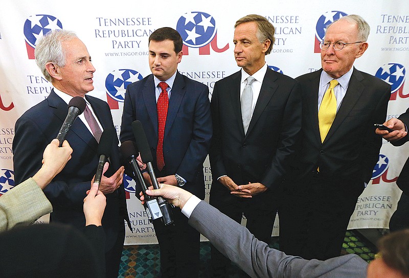 Sen. Bob Corker, R-Tenn., left, speaks before the Tennessee Republican Party's 2016 Statesmen's Dinner on Friday, May 13, 2016, in Nashville, Tenn. With Corker are, from left, state Republican party chairman Ryan Haynes, Tennessee Gov. Bill Haslam, and Sen. Lamar Alexander, R-Tenn. (AP Photo/Mark Humphrey)