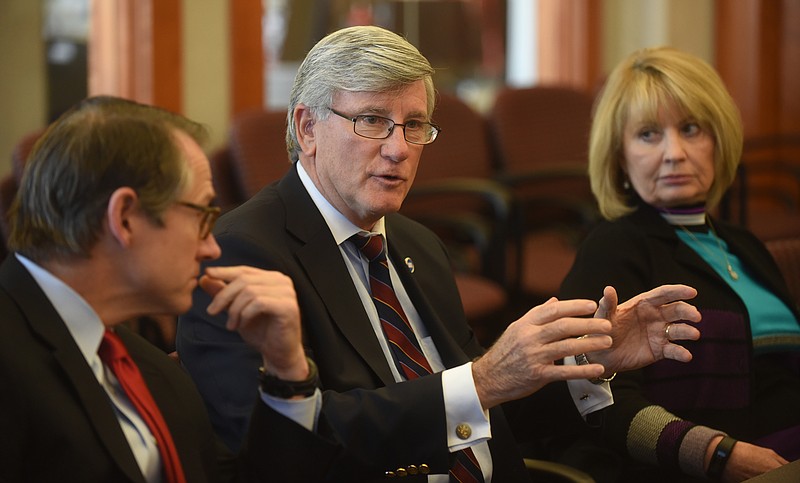 Republican Sen. Todd Gardenhire, center, talks as and Sen. Bo Watson and Tennessee State Rep. Patsy Hazlewood listen. Gardenhire na dWatson both voted to adopt the measure repealing the Hall tax in April. Hazelwood voted "yes" on the third consideration of an amended passage.