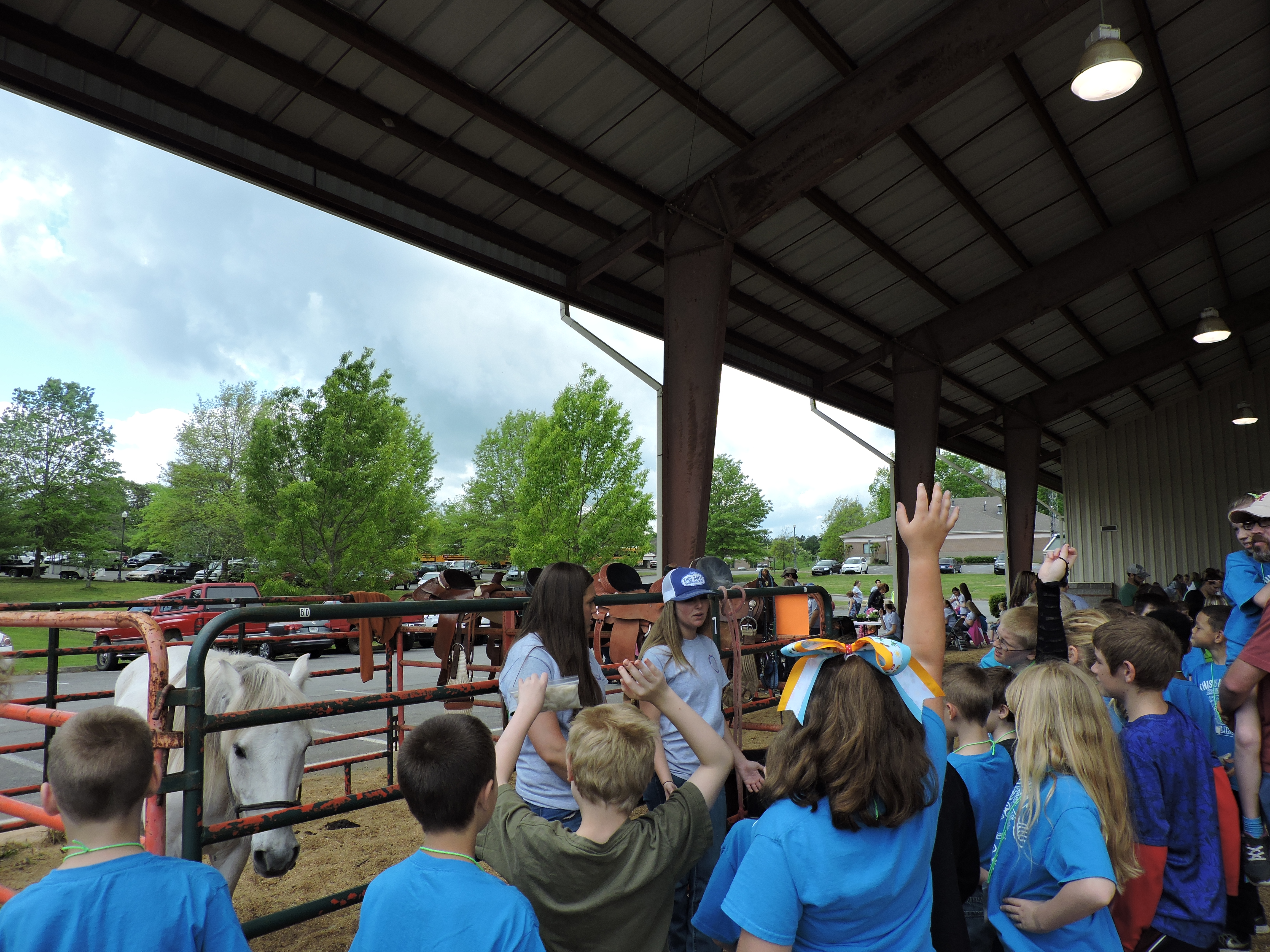 Gordon Lee High School students Josie Melton, left, and Emily Smith talk to students about riding horses.