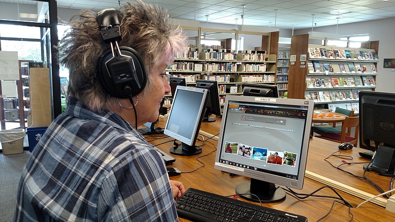 Nancy Bovell uses Rosetta Stone software at the Collegedale Library.