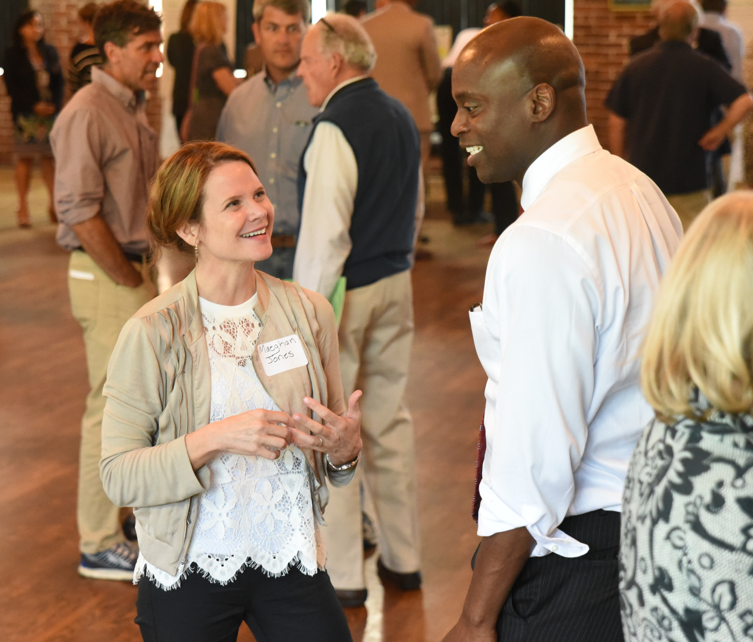 Maeghan Jones talks with attorney Wade Hinton on Monday at the Chattanooga 2.0 open house event held at the Bessie Smith Cultural Center.