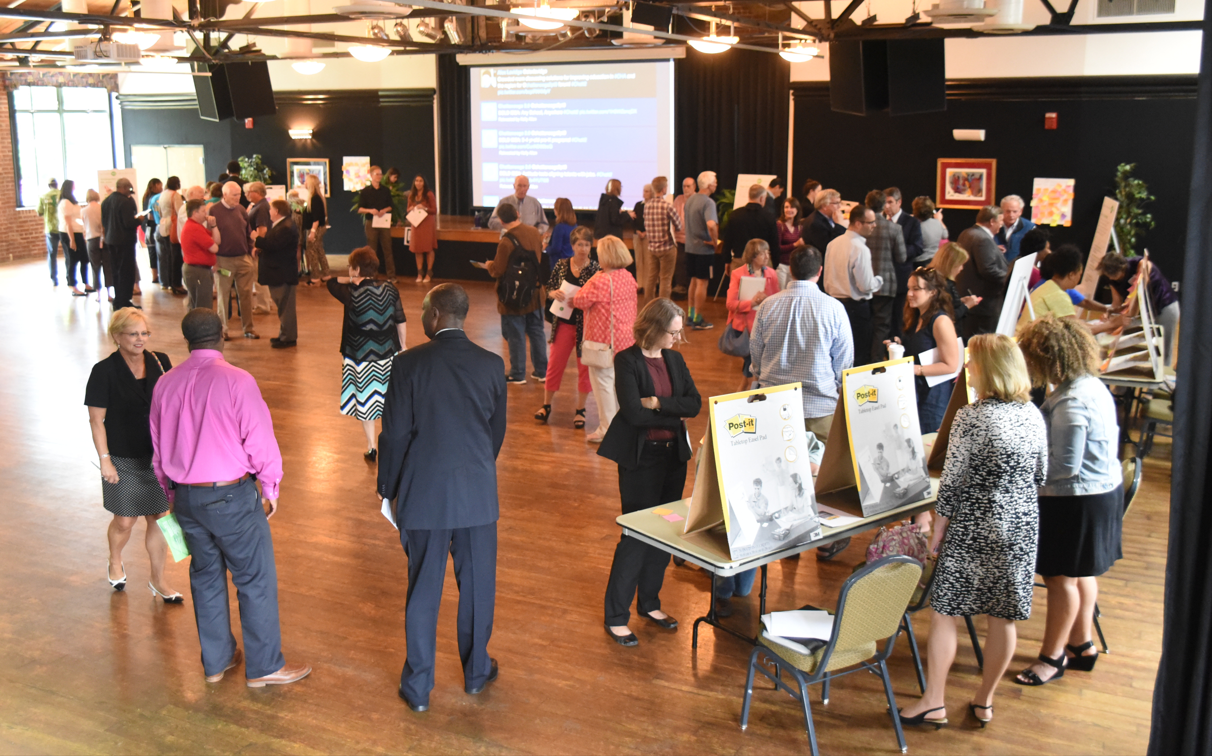 Dozens of teachers and concerned citizens attend the Chattanooga 2.0 open house event held at the Bessie Smith Cultural Center late Monday.