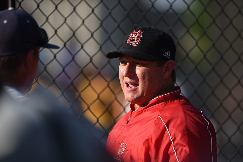 Signal Mountain coach  Josh Gandy talks during the game against Chattanooga Christian School Wednesday at CCS.