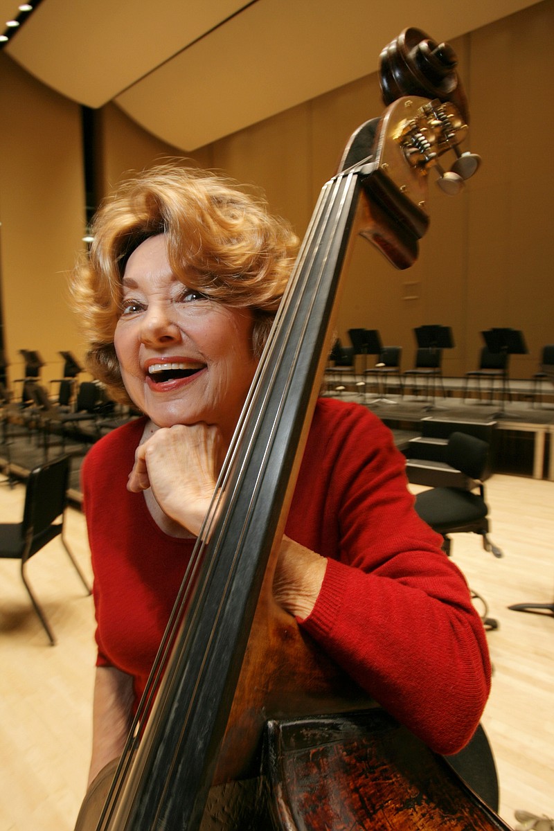 
              In this Nov. 15, 2007 photo, Jane Little, an Atlanta Symphony Orchestra bassist, poses for a photo in Atlanta. Little, whose career spanned a world-record with a single orchestra, has died at age 87 after collapsing onstage Sunday, May 15, 2016, during a performance. (Louie Favorite/Atlanta Journal-Constitution via AP)  MARIETTA DAILY OUT; GWINNETT DAILY POST OUT; LOCAL TELEVISION OUT; WXIA-TV OUT; WGCL-TV OUT; MANDATORY CREDIT
            