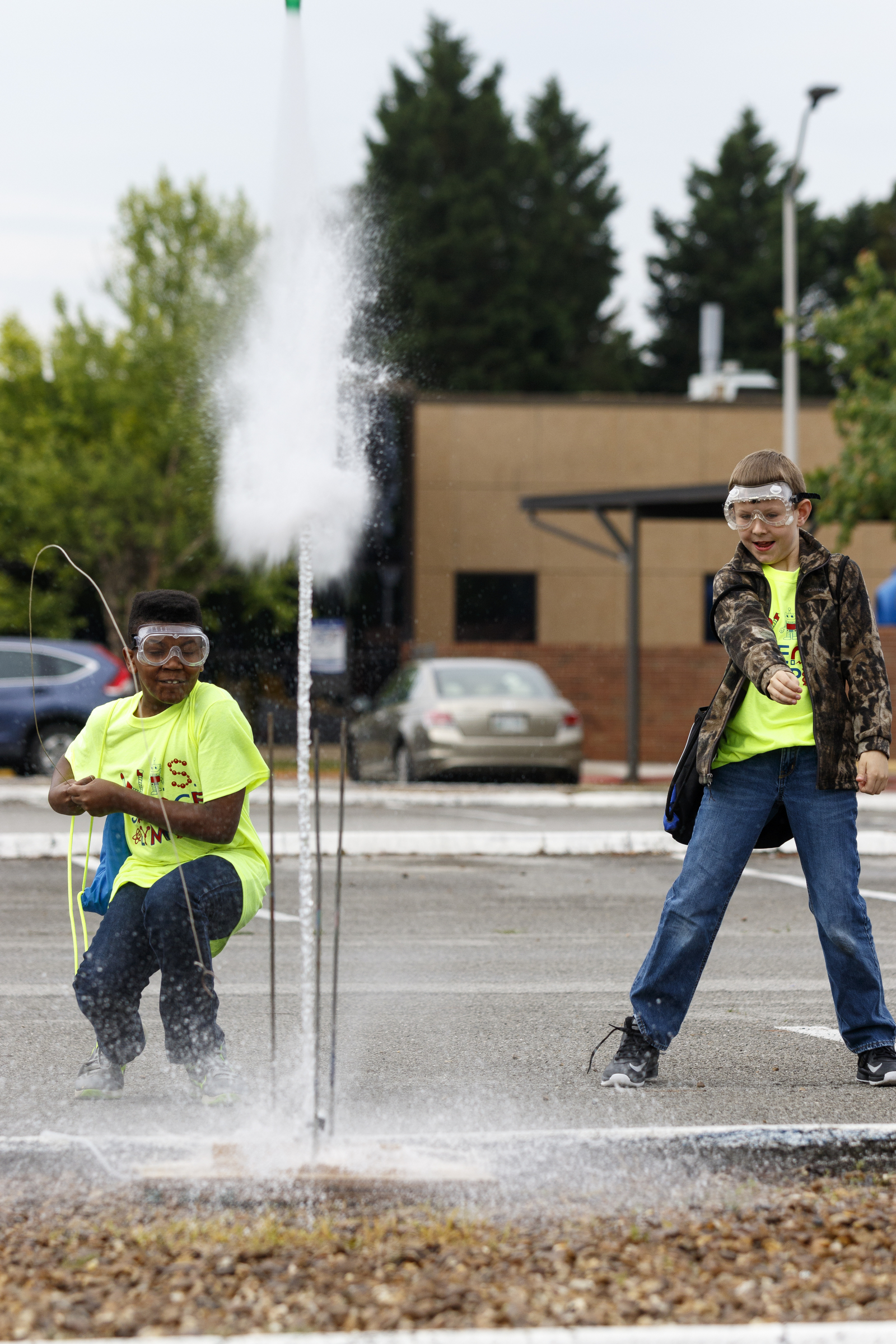 Jayden Madison, left, and Ryan Matthews launch a pressurized water-rocket during the 10th annual regional Elementary Science Olympiad at Chattanooga State Technical Community College on Tuesday, May 17, 2016, in Chattanooga, Tenn. Hundreds of elementary students competed in science-based competitions that included egg drops, pressurized rockets, and bridge building.