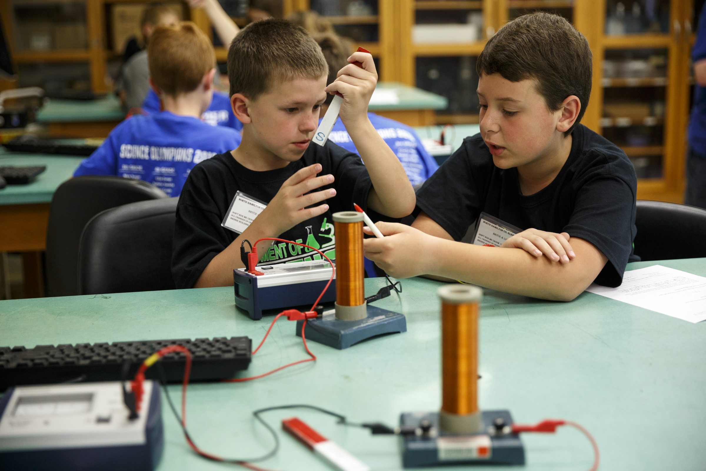 Luke Culver, left, and Bryce Coln work with electromagnets in a classroom during the 10th annual regional Elementary Science Olympiad at Chattanooga State Technical Community College on Tuesday, May 17, 2016, in Chattanooga, Tenn. Hundreds of elementary students competed in science-based competitions that included egg drops, pressurized rockets, and bridge building.