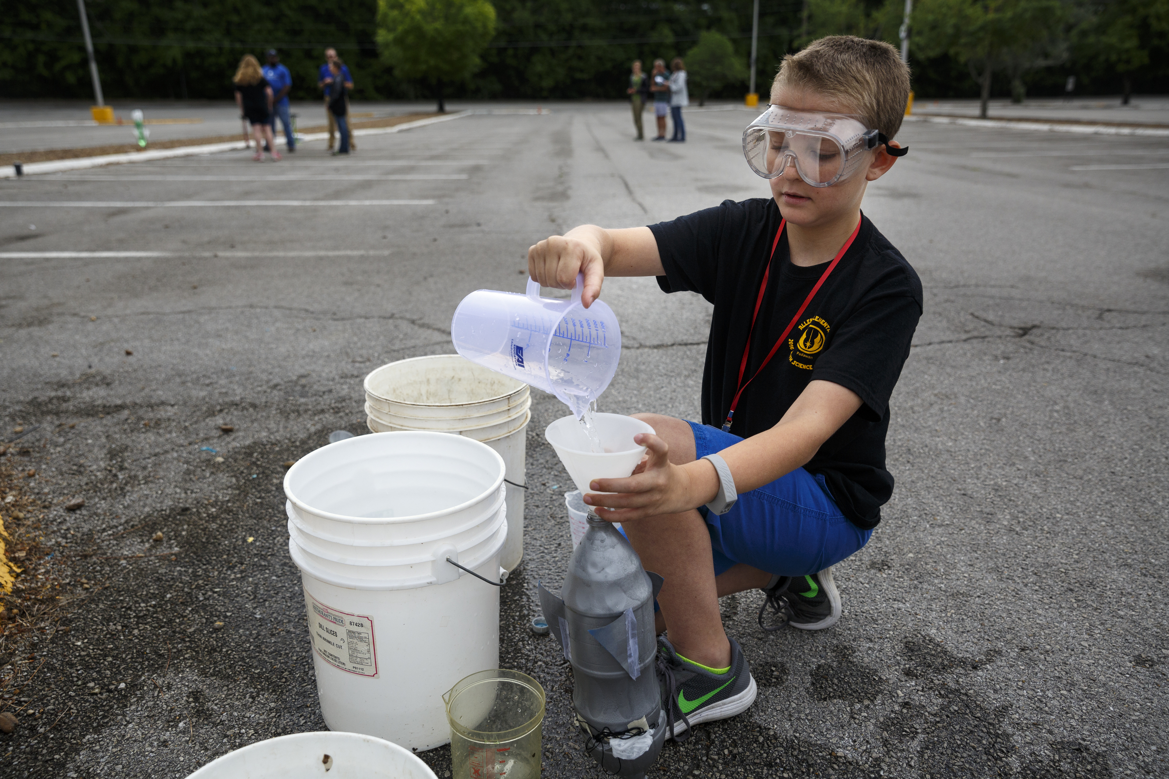 Trey Hassler fills his pressurized rocket with water during the 10th annual regional Elementary Science Olympiad at Chattanooga State Technical Community College on Tuesday, May 17, 2016, in Chattanooga, Tenn. Hundreds of elementary students competed in science-based competitions that included egg drops, pressurized rockets, and bridge building.