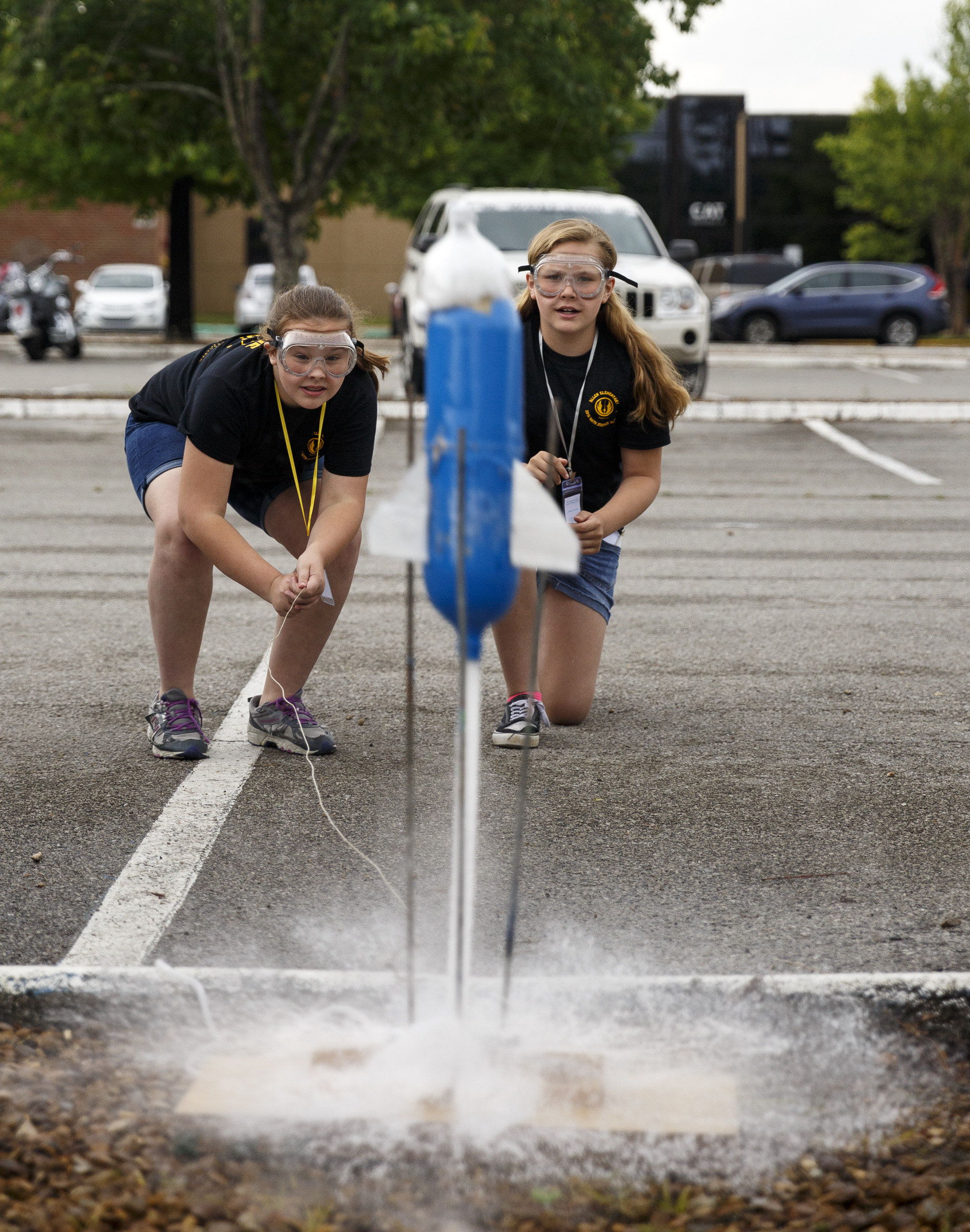 Riley Brown, left, and Jordan Corcione launch a pressurized water rocket during the 10th annual regional Elementary Science Olympiad at Chattanooga State Technical Community College on Tuesday, May 17, 2016, in Chattanooga, Tenn. Hundreds of elementary students competed in science-based competitions that included egg drops, pressurized rockets, and bridge building.
