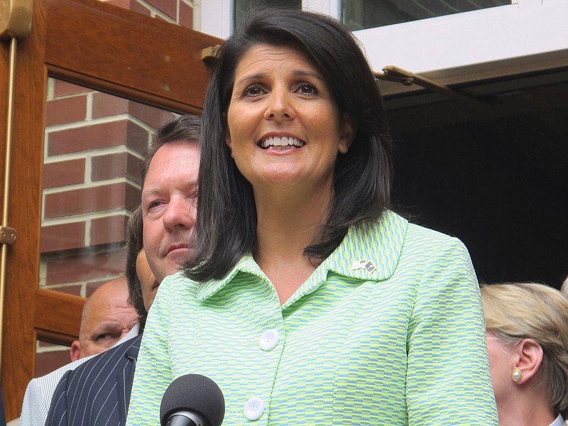 
              FILE - In this Monday, May 2, 2016 file photo, South Carolina Gov. Nikki Haley speaks with reporters outside the Jasper County office building in Ridgeland, S.C., after a briefing on a $4.5 billion container terminal South Carolina and Georgia are jointly building on the Savannah River. The South Carolina Legislature passed a bill Tuesday, May 17, 2016, prohibiting abortion after 19 weeks, becoming the 17th state to pass the restrictive ban. The legislation will now head to Gov. Haley's desk. (AP Photo/Bruce Smith, File)
            