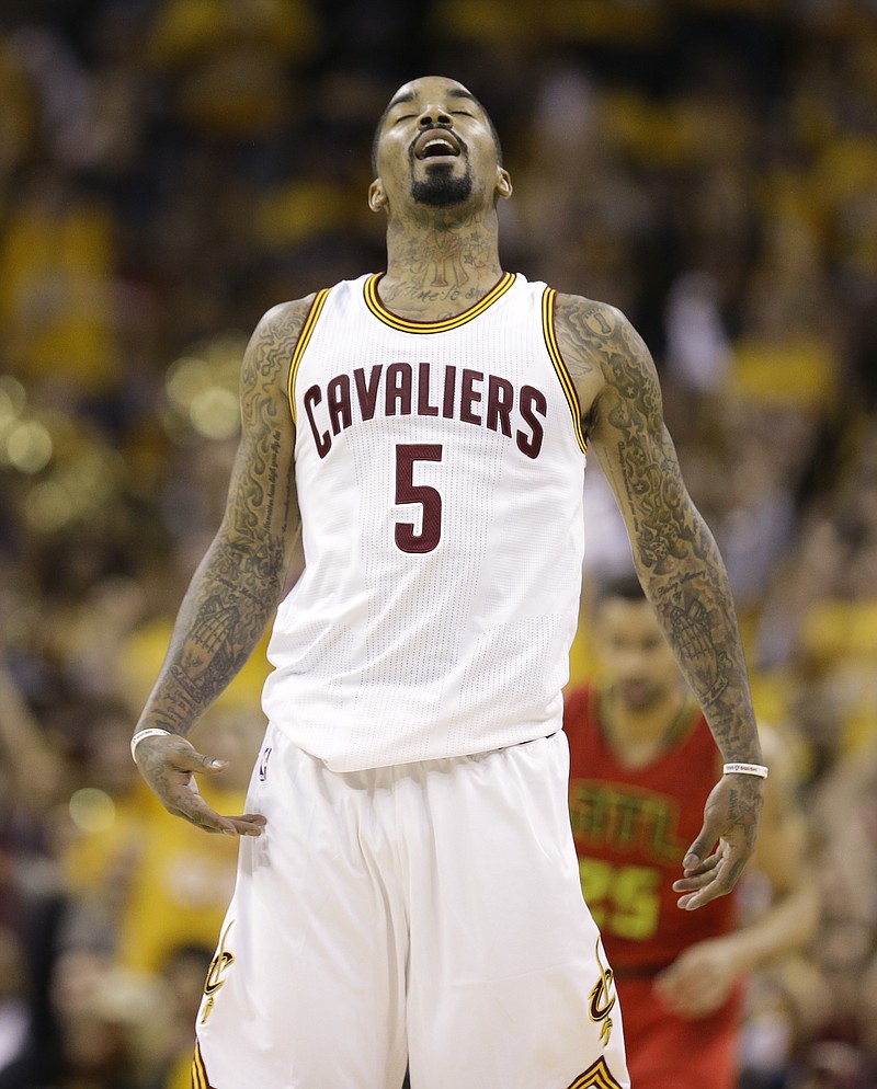 
              FILe - In this May 4, 2016, file photo, Cleveland Cavaliers guard J.R. Smith (5) reacts after hitting a 3-point shot against the Atlanta Hawks in the first half during Game 2 of a second-round NBA basketball playoff series, in Cleveland. Smith, whose outside shooting and tenacious defense have helped the Cavs sweep their first two series in this year's playoffs, admires the way Cleveland fans stick with their teams — win or lose.  (AP Photo/Tony Dejak, File)
            