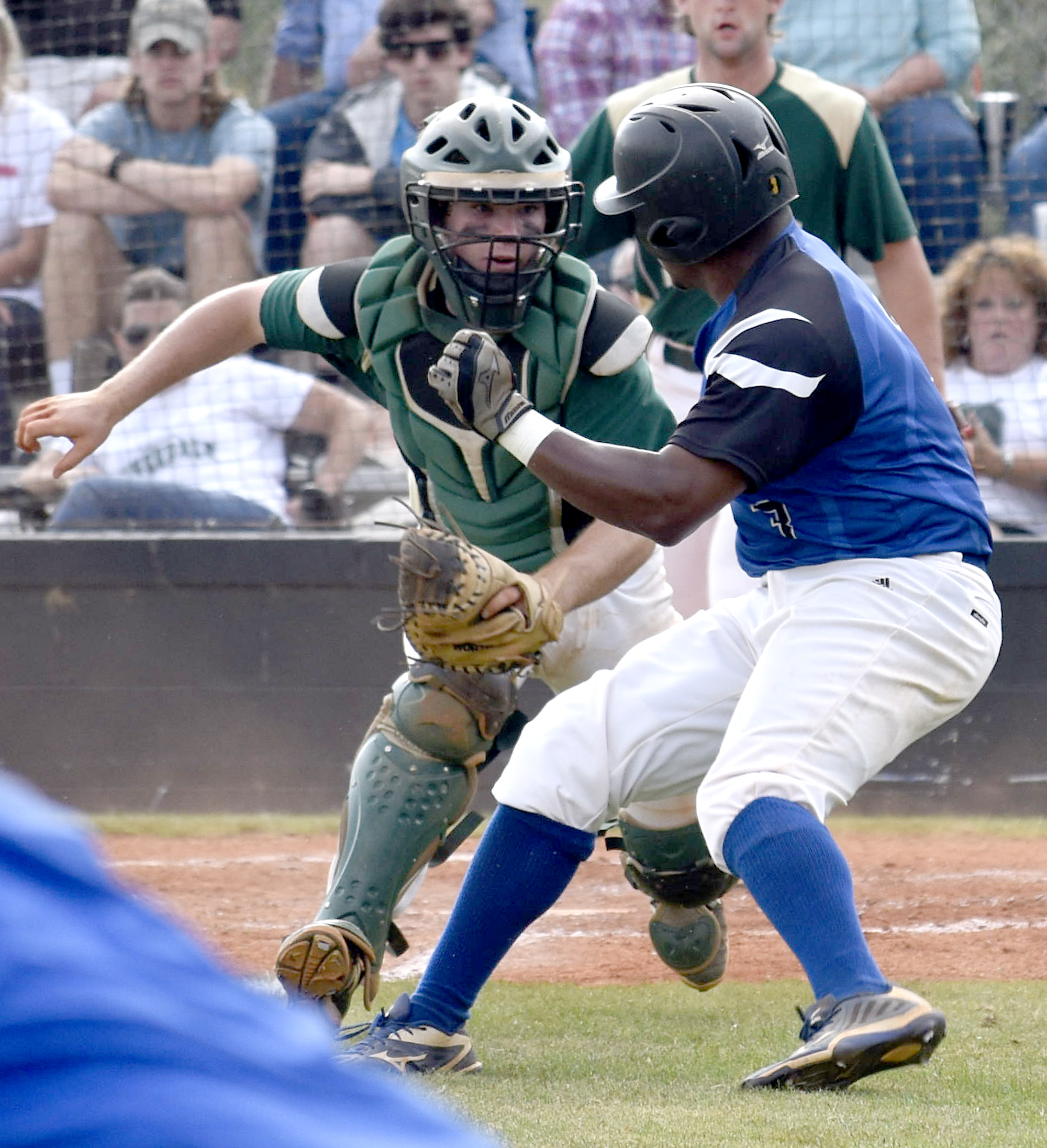 Silverdale cathcer Hayden Spencer (10) moves to tag out Boyd-Buchanan's E.J. Matthews (3) during a rundown. The Silverdale Baptist Seahawks visited the Boyd-Buchanan Buccaneers in the Region 3-A championship baseball game May 18, 2016.