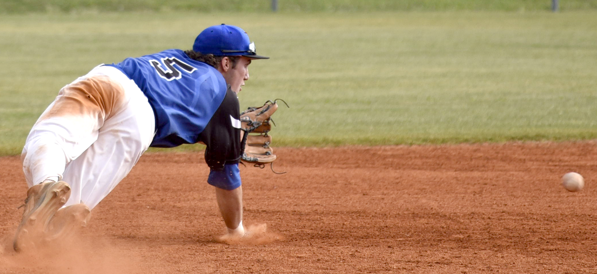 Boyd-Buchanan shortstop Cade Evans (5) dives to knock down a Silverdale base hit. The Silverdale Baptist Seahawks visited the Boyd-Buchanan Buccaneers in the Region 3-A championship baseball game May 18, 2016.