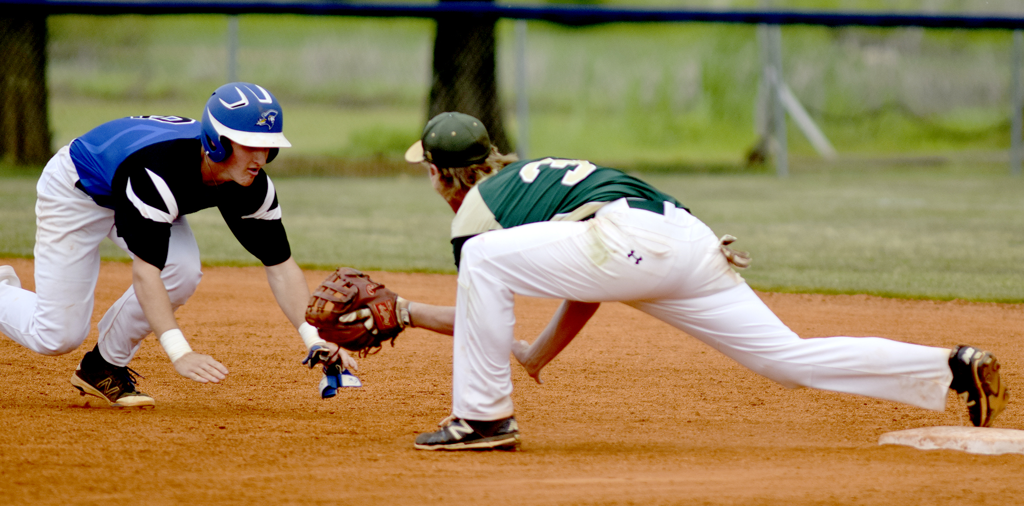 Boyd-Buchanan's Thomas Baker (8) is doubed off second for a out as Silverdale second baseman Sawyer Junkins (32) takes the throw. The Silverdale Baptist Seahawks visited the Boyd-Buchanan Buccaneers in the Region 3-A championship baseball game May 18, 2016.