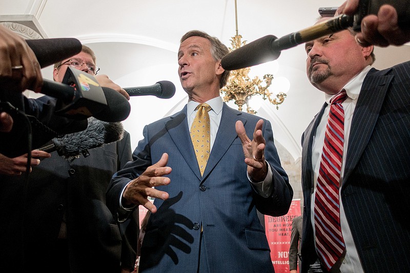 
              Tennessee Gov. Bill Haslam speaks to reporters in the Old Supreme Court Chamber of the state Capitol in Nashville, Tenn., on Wednesday, May 18, 2016. The Republican governor questioned the need for a special legislative session to respond to a directive by President Barack Obama's administration on bathroom access for transgender students. (AP Photo/Erik Schelzig)
            