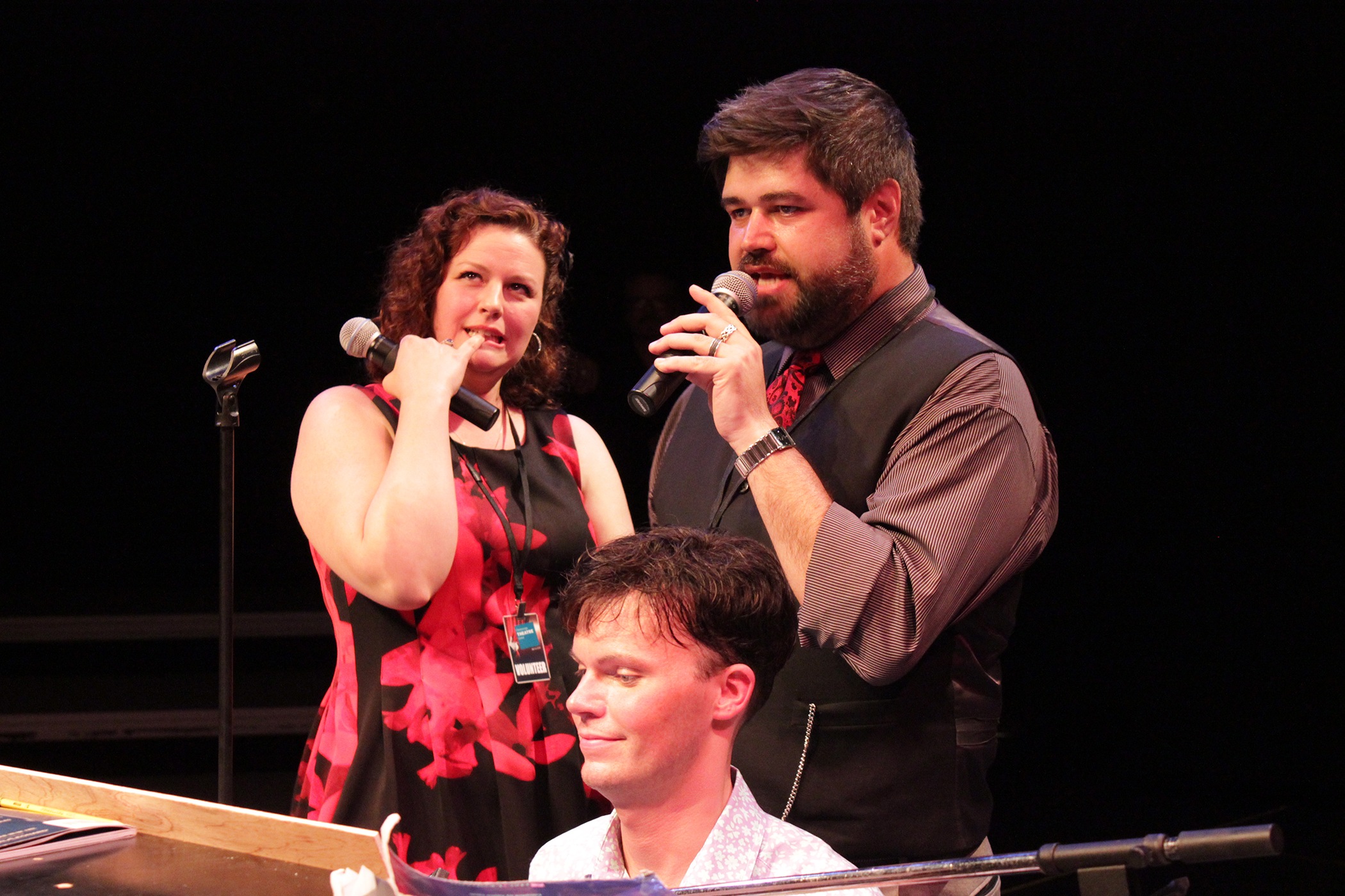 Mindy and Bryan Kelly, co-chairmen of the Backstage Bash, sing