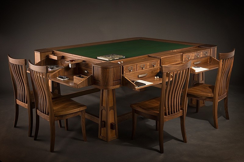 The Sultan dedicated gaming table retails for $15,000 to $21,000, depending on features such as height, width and additional accessories, and is a tabletop gamer's dream accessory. Made of hardwood, it features a recessed play area and fold-down player areas for storing rule books, dice and other items. No, it's definitely not cheap.