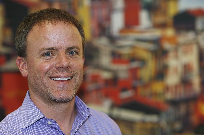 In this Monday, May 16, 2016, photograph, Ben Walker, owner of a company that transcribes phone calls for doctors, lawyers and other professionals, poses for a photo at his office in Denver. Walker has already shifted his salaried workers to hourly pay, knowing that his firm would be affected by the new overtime regulations the U.S. Labor Department is expected to release in the next week. (AP Photo/David Zalubowski)