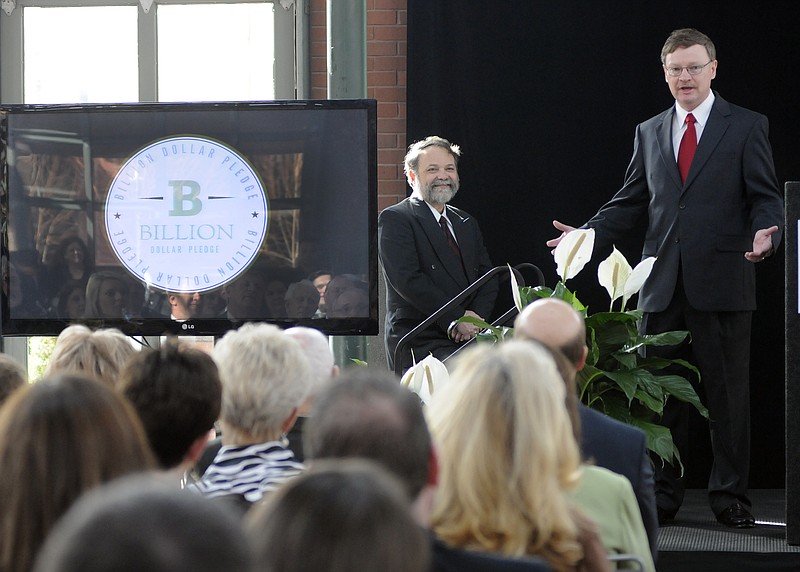 Carey Brown, right, addresses backers at the launch of the Covenant Values Foundation, where he pledged to give away $1 billion by the time he retired.