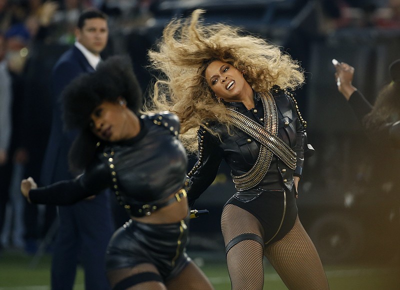 
              FILE - In this Feb. 7, 2016 file photo, Beyonce performs during halftime of the NFL Super Bowl 50 football game in Santa Clara, Calif. Dierks Bentley, Karen Fairchild and more country artists are welcoming Beyonce’s excursion into country music with song “Daddy Lessons” from her new album “Lemonade.” The acoustic guitar-driven song mixes New Orleans horns and country lyrics that many in Nashville say is a bona fide country tune. (AP Photo/Matt Slocum, File)
            