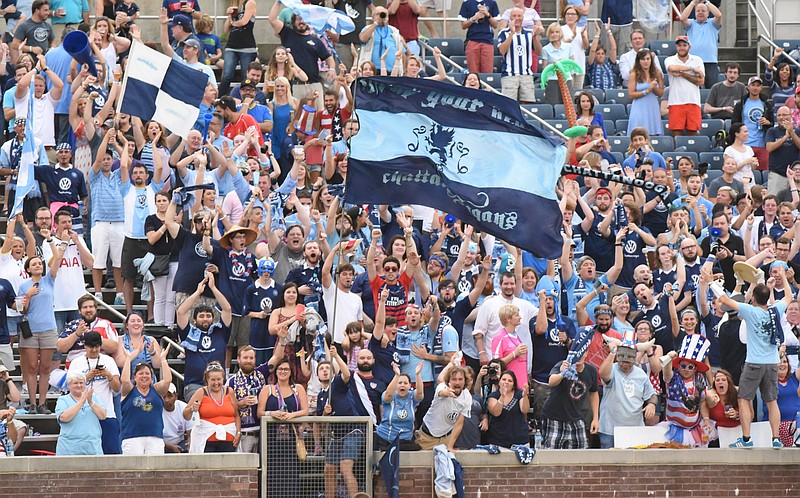 Chattanooga Football Club fans cheer after their team scored the first goal of the game as they host Nashville at Finley Stadium on Saturday, July 4, 2015, in Chattanooga, Tenn. 