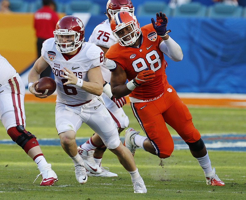 Former Clemson defensive end Kevin Dodd, now an outside linebacker with the Tennessee Titans, chases Oklahoma quarterback Baker Mayfield during the Orange Bowl this past New Year's Eve.