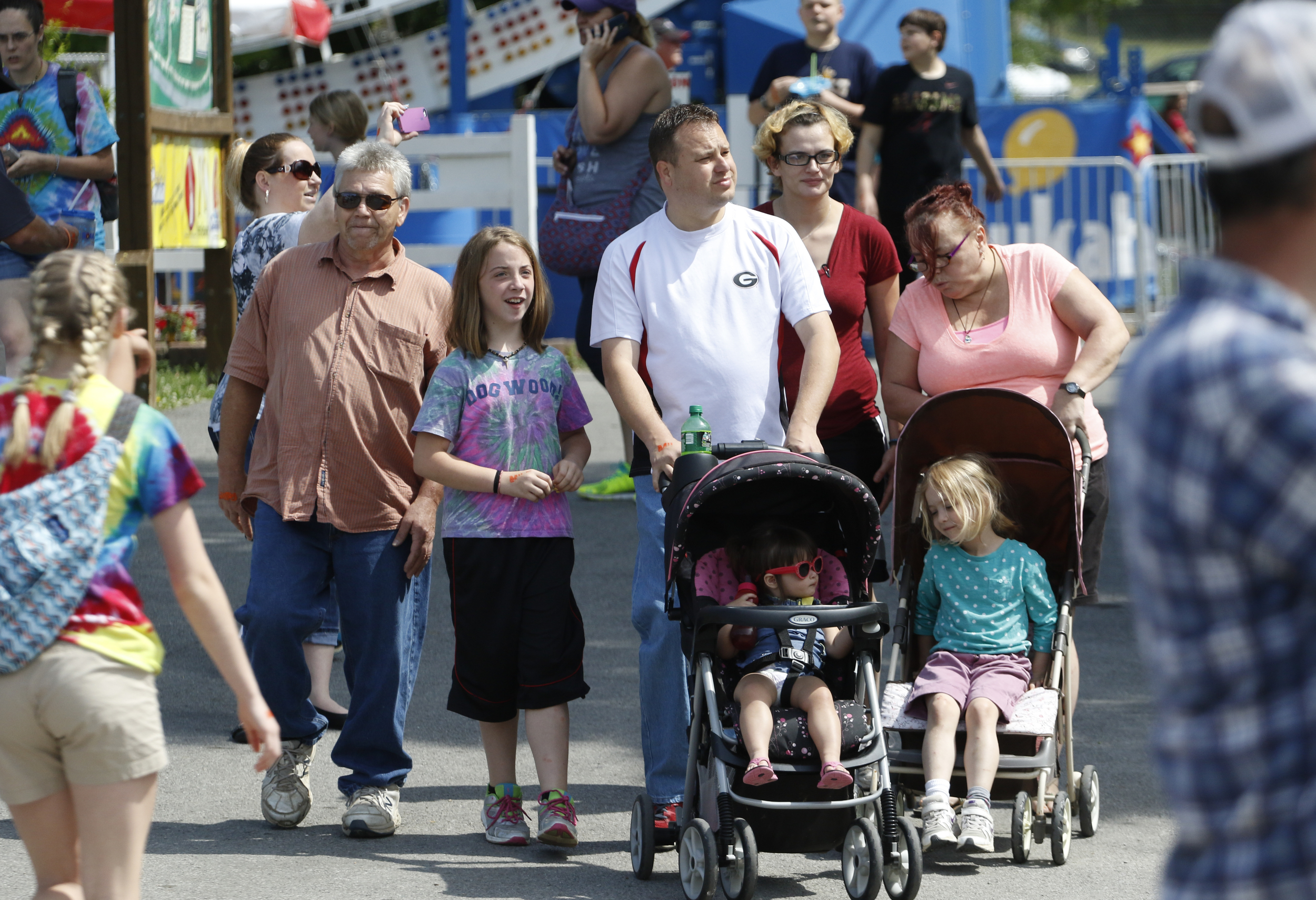 Family members of murder victim Natalia Roberts enjoy a recent outing at Lake Winnepesaukah. Her father, Kirk Roberts, pictured at far left, took in her children after her slaying. The rest of the family includes, standing from left, Kirk Roberts' granddaughter Anabell, 10, nephew Stephen, fiancee Sheri Taylor and her mother, Tina Taylor, and from left in strollers, granddaughter Addisyn, 1, and Adeline, 5.