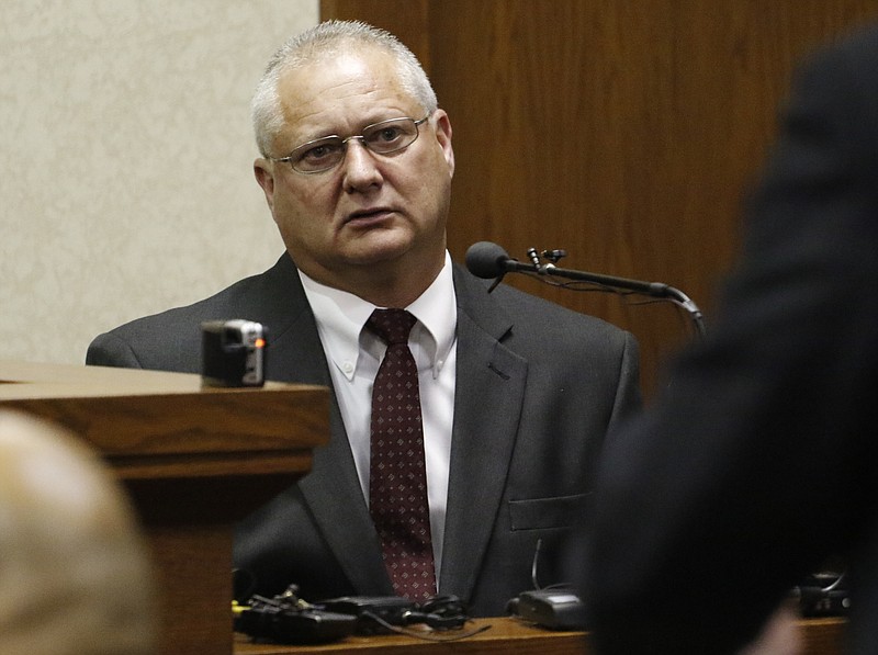 Staff Photo by Dan Henry / The Chattanooga Times Free Press- 2/15/16. Detective Rodney Burns of the Gatlinburg Police Department is questioned as a witness before Judge Robert Philyaw during a preliminary hearing for the Ooltewah High School basketball coaches and the school's athletic director in Hamilton County Juvenile Court on February 25, 2016. Hamilton County District Attorney Neal Pinkston charged head coach Andre "Tank" Montgomery, assistant coach Karl Williams and Athletic Director Allard "Jesse" Nayadley with failing to report child abuse or suspected child sexual abuse in connection with the rape of an Ooltewah High School freshman by his basketball teammates Dec. 22, 2015. 