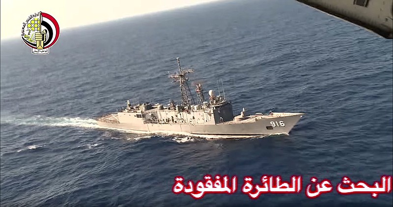 In this Thursday, May 19, 2016, video image released by the Egyptian Defense Ministry, an Egyptian plane flies over a ship during the search in the Mediterranean Sea for the missing EgyptAir flight 804 plane which crashed after disappearing from the radar early Thursday morning while carrying 66 passengers and crew from Paris to Cairo.