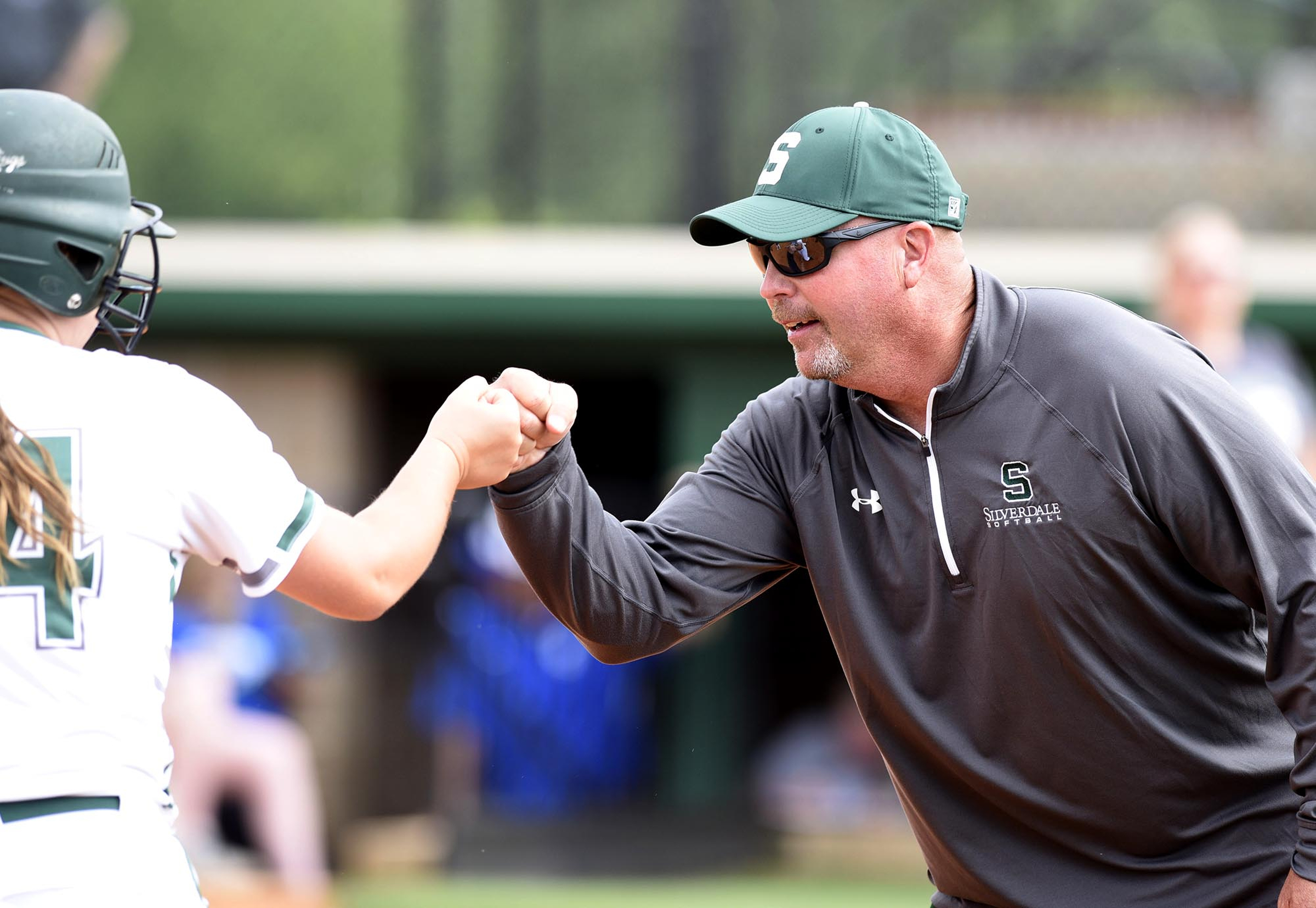 Silverdale coach Tim Couch fist bumps Lindsey Newell (34) has she heads to the plate with a home run.  The Gordonsville Tigers visited Silverdale Baptist Academy in a TSSAA Sectional matchup Saturday May 21, 2016.