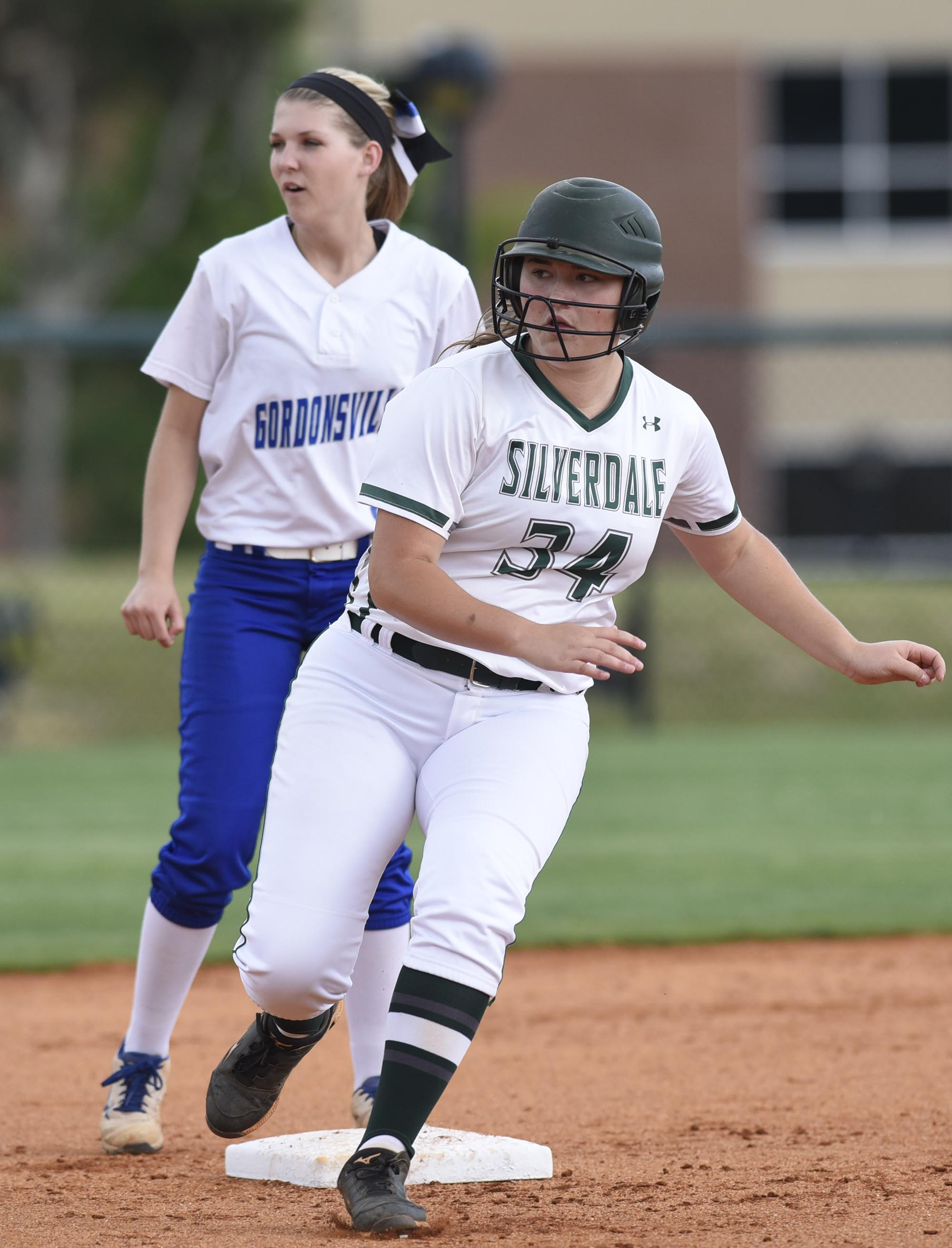 Silverdale's Lindsey Newell (34) looks to the ball in the outfield as she rounds second.  The Gordonsville Tigererettes visited Silverdale Baptist Academy in a TSSAA Sectional matchup Saturday May 21, 2016.