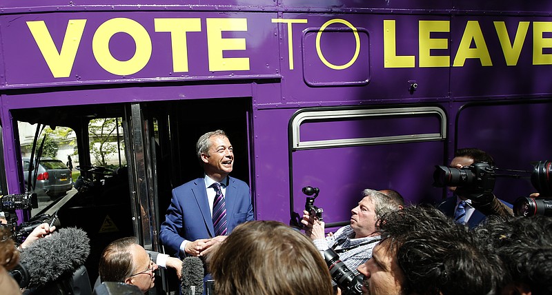 
              British politician and leader of the UKIP party Nigel Farage talks to members of the media as he launches his party's campaign for Britain to leave the EU, outside the EU representative office in London, Friday, May, 20, 2016. Britain will decide in one month whether to deal a historic hammer blow to the European integration project by placing their island nation on an independent path outside the European Union. (AP Photo/Alastair Grant )
            