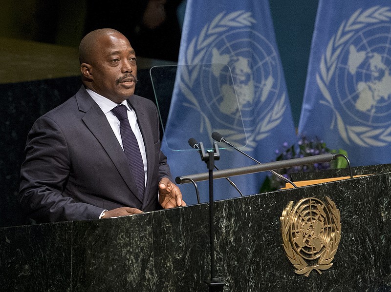 
              FILE - In this file photo dated Friday, April 22, 2016, Congolese President Joseph Kabila speaks Friday, April 22, 2016 at U.N. headquarters.  Longtime incumbent Kabila is constitutionally barred from seeking another term in office, but Congo's top opposition candidate for the upcoming presidential election Moise Katumbi flew to South Africa for medical treatment Friday May, 20, 2016, one day after authorities issued an arrest warrant for him. (AP Photo/Mary Altaffer, FILE)
            