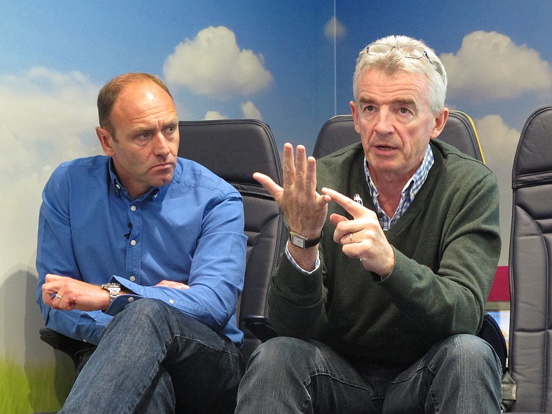 
              A Tuesday, April 24, 2016 photo of Ryanair Chief Executive, Michael O'Leary, right, at the airline's Dublin headquarters addressing media alongside Ryanair marketing director, Kenny Jacobs. European budget carrier Ryanair has posted record full-year profits and passenger figures, Monday, May 23, 2016, and expects both to hit new highs this summer amid rapid growth and declining fares. (AP Photo/Shawn Pogatchnik)
            