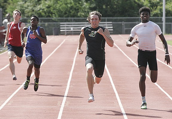 Rhea County's Chase Stoll, center, is in third place in the decathlon with 3,080 points after Monday's five events at the TSSAA state competition in Murfreesboro.