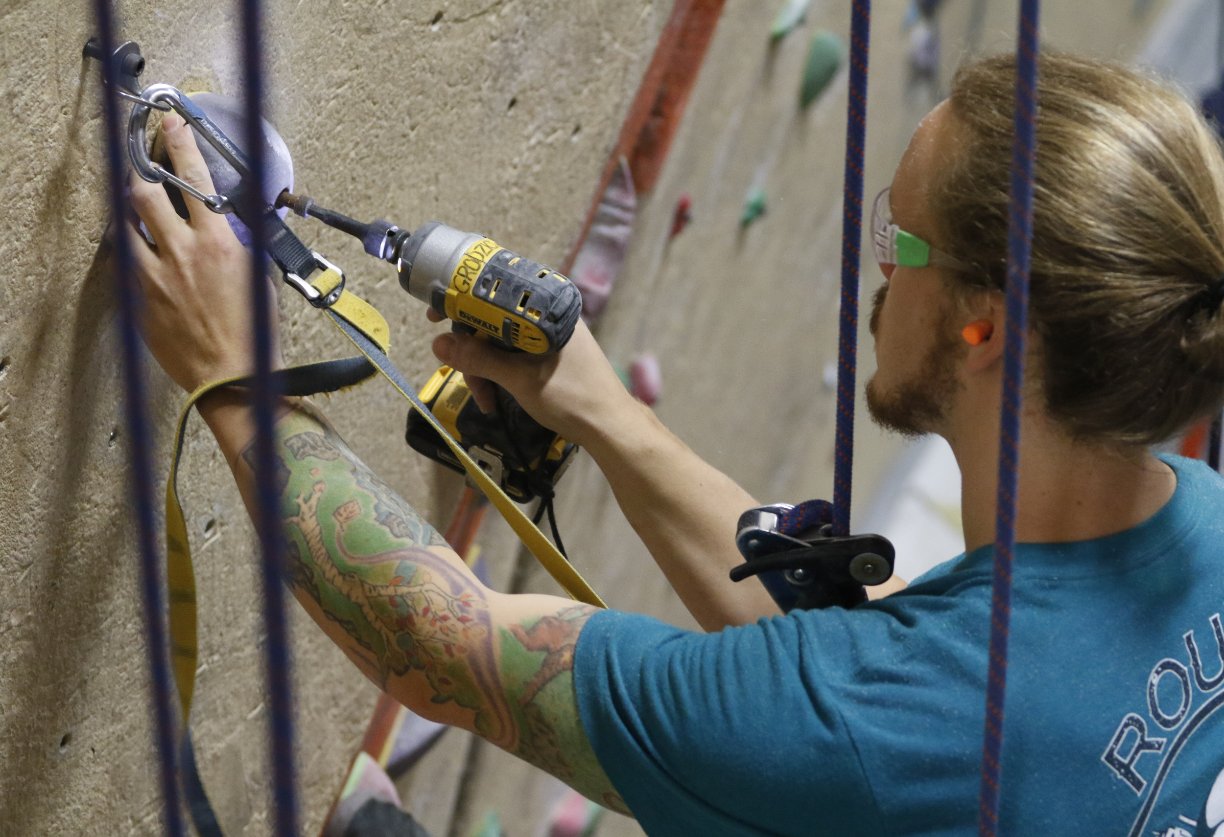 Staff Photo by Dan Henry / The Chattanooga Times Free Press- 5/19/16. Cody Grodzki, the director of route setting for High Point Climbing and Fitness, resets the top rope room on May 19, 2016.