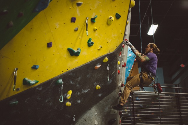 High Point Climbing and Fitness Director of Route Setting Cody Grodzki on the job.