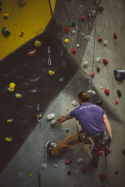 High Point Climbing and Fitness Director of Route Setting Cody Grodzki on the job.