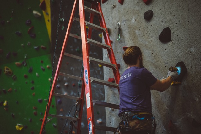 High Point Climbing and Fitness Director of Route Setting Cody Grodzki on the job.