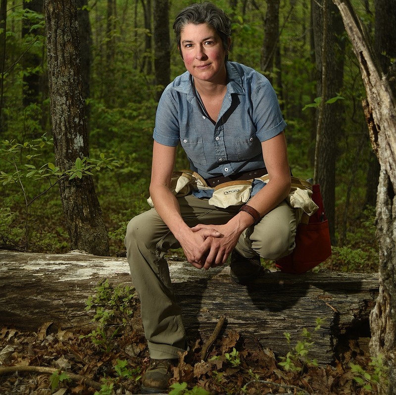 Signal Mountain resident Amy Foster scouts her property for fungi. Some of what she finds she sells to local restaurants, while others she keeps for her own culinary and medicinal uses.