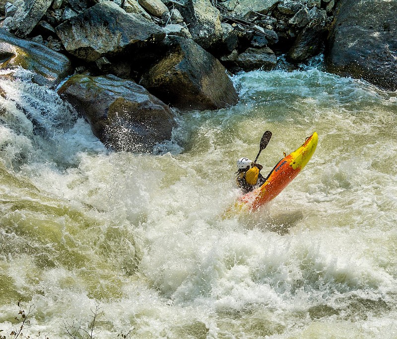 Burns paddles through the Steepness rapids on the North Payette in Idaho.