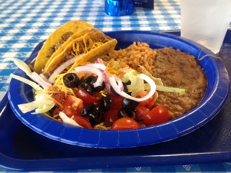 The Friday taco bar at The Chef and His Wife in Hixson includes all the makings for beef tacos with sides of refried beans and Spanish rice.